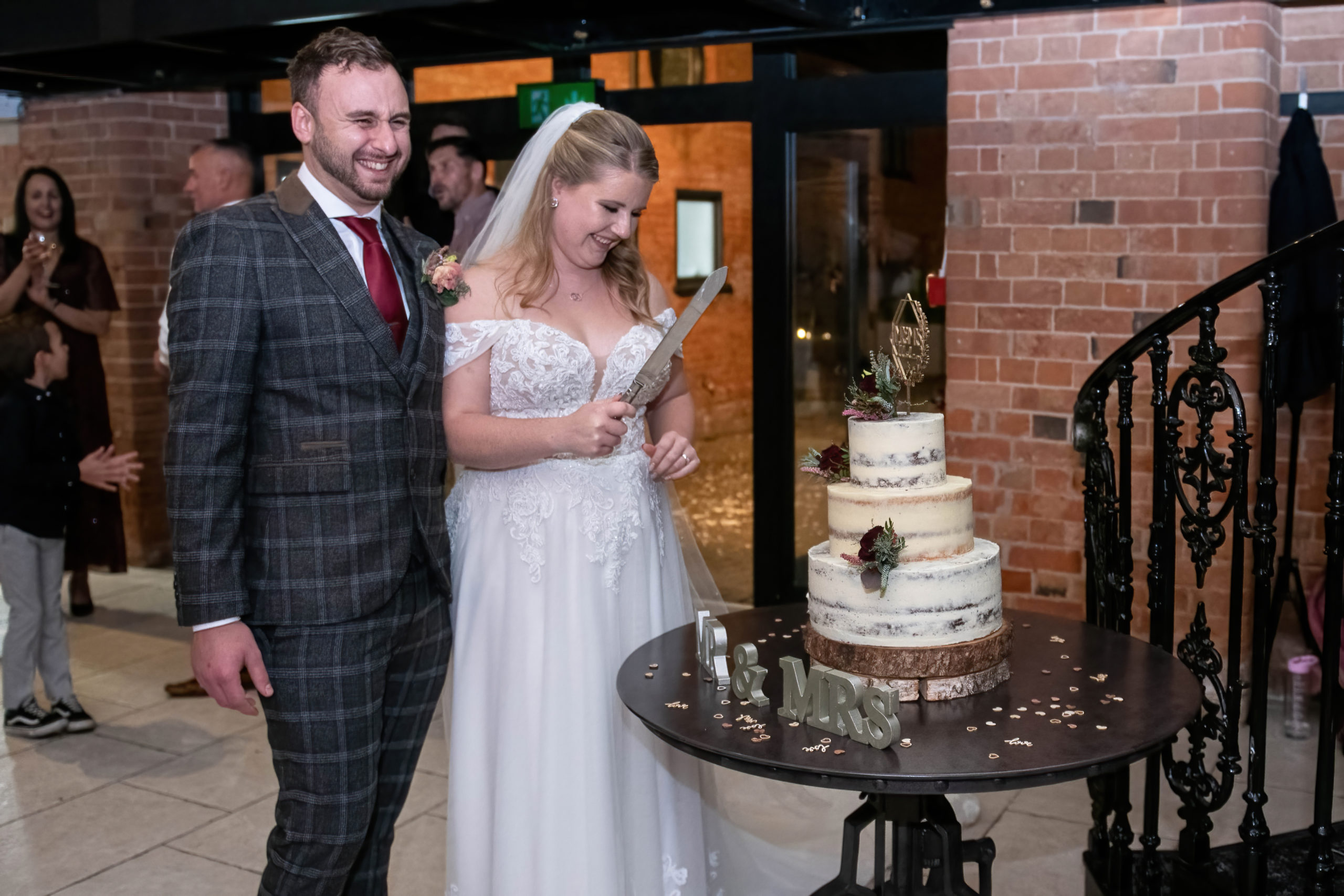 Cake cutting moment for Bethany and Josh