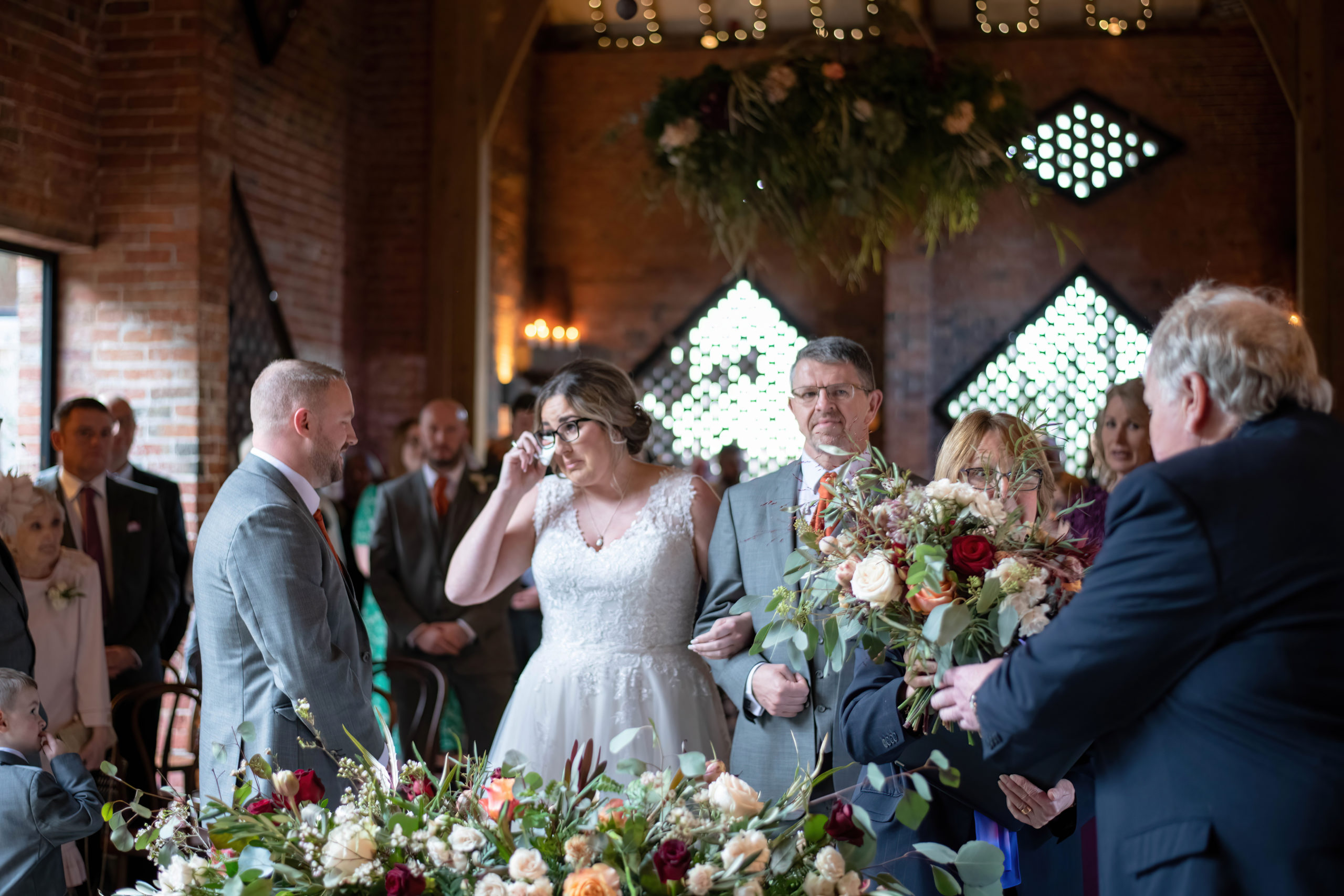 Laura walking down the aisle at Shustoke Barn