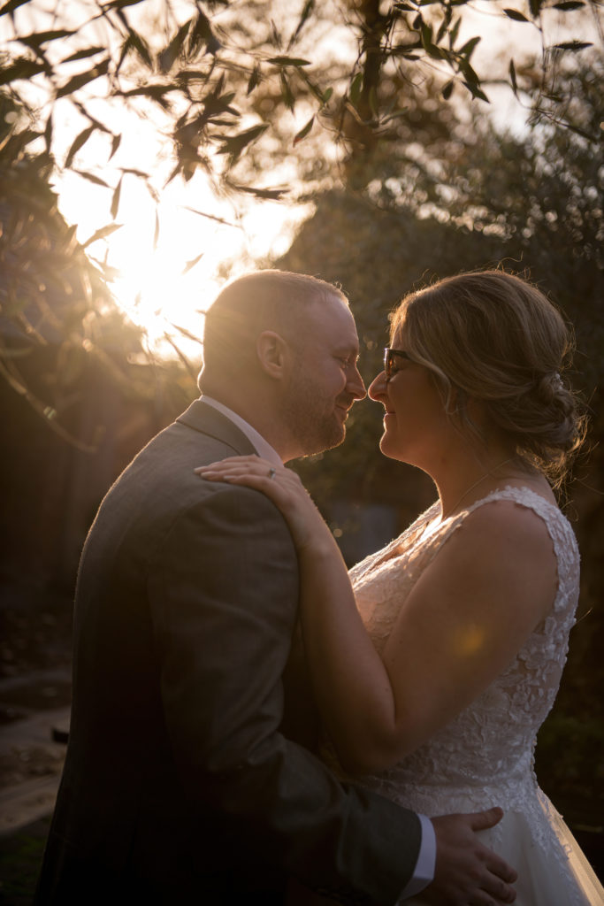 Couple portraits in the courtyard at golden hour