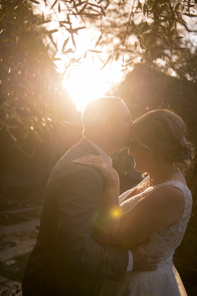 Couple portraits in the courtyard at golden hour
