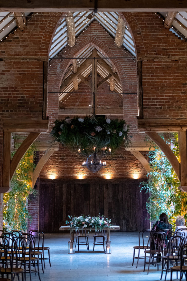 Ceremony setup at Shustoke Barn with rustic decor