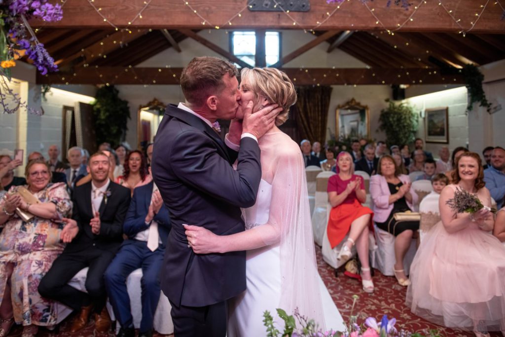 First kiss of Michelle and Peter as husband and wife