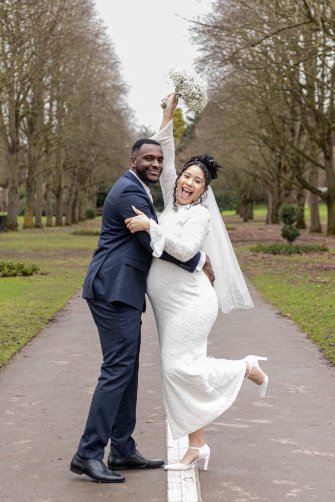 Wedding photography in Warwickshire capturing joyful newlywed portraits